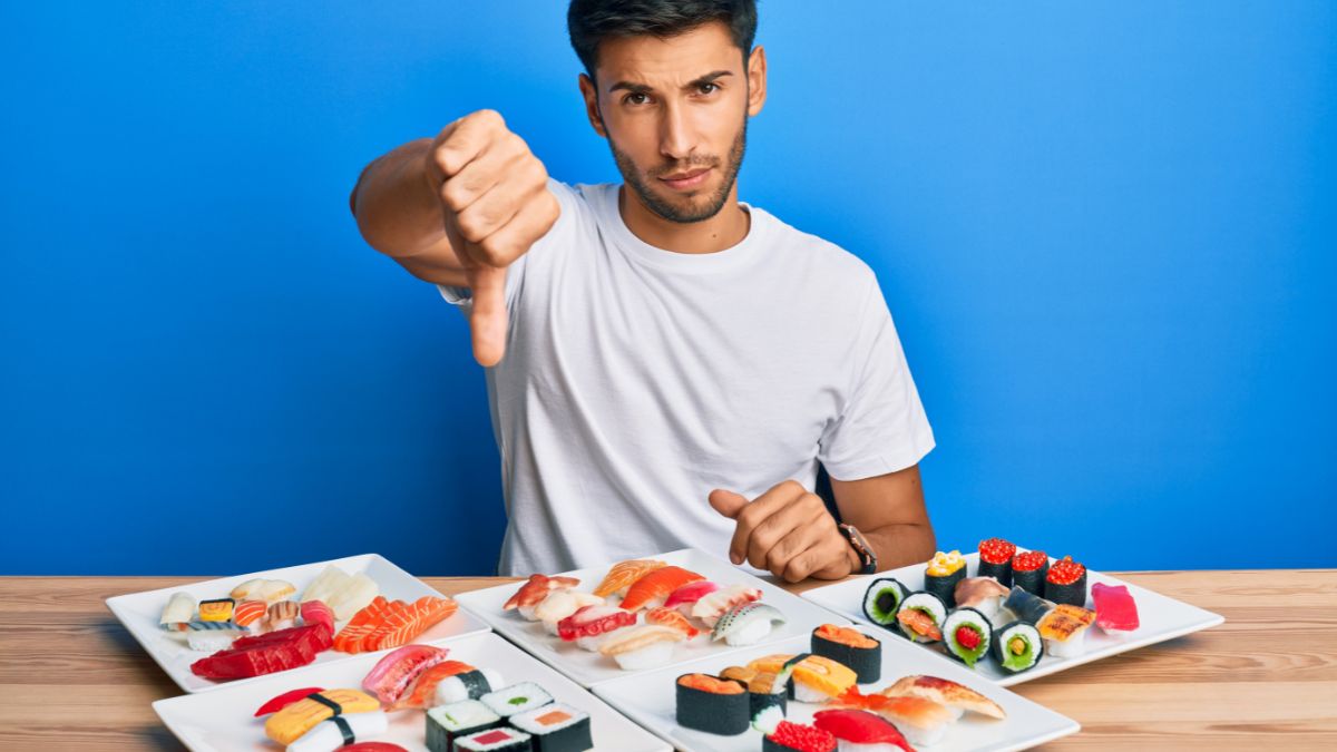 thumbs down with sushi