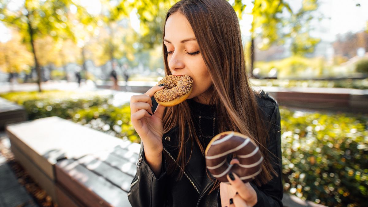 woman eating donuts