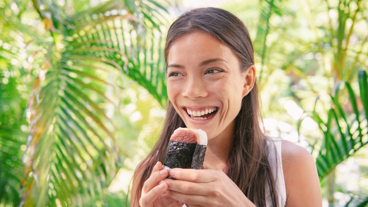 woman eating spam