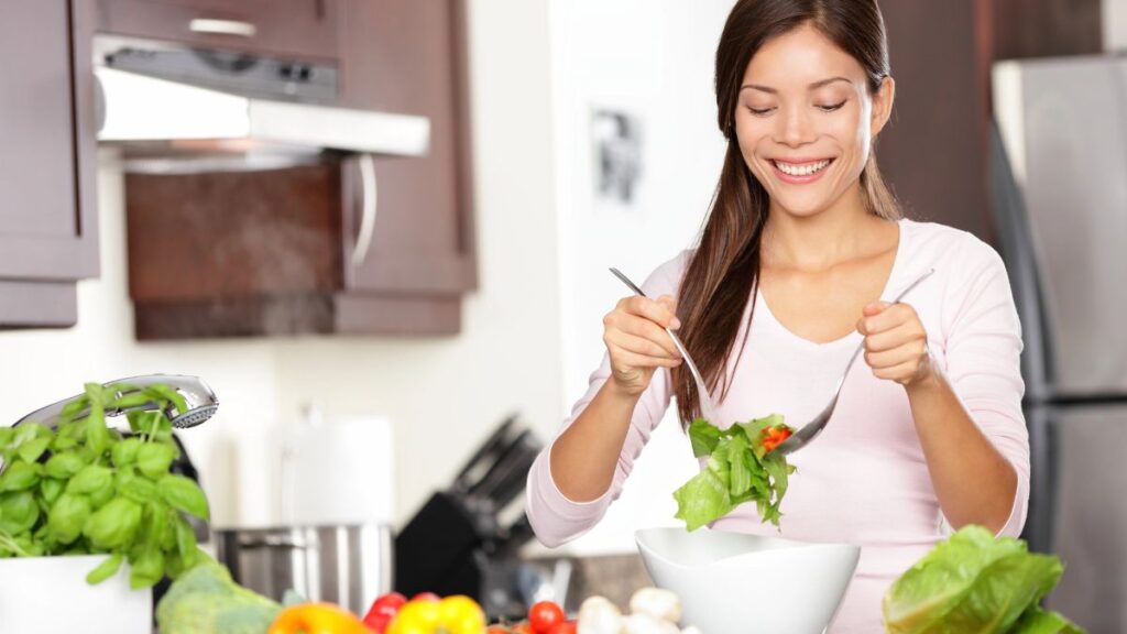 woman making salad