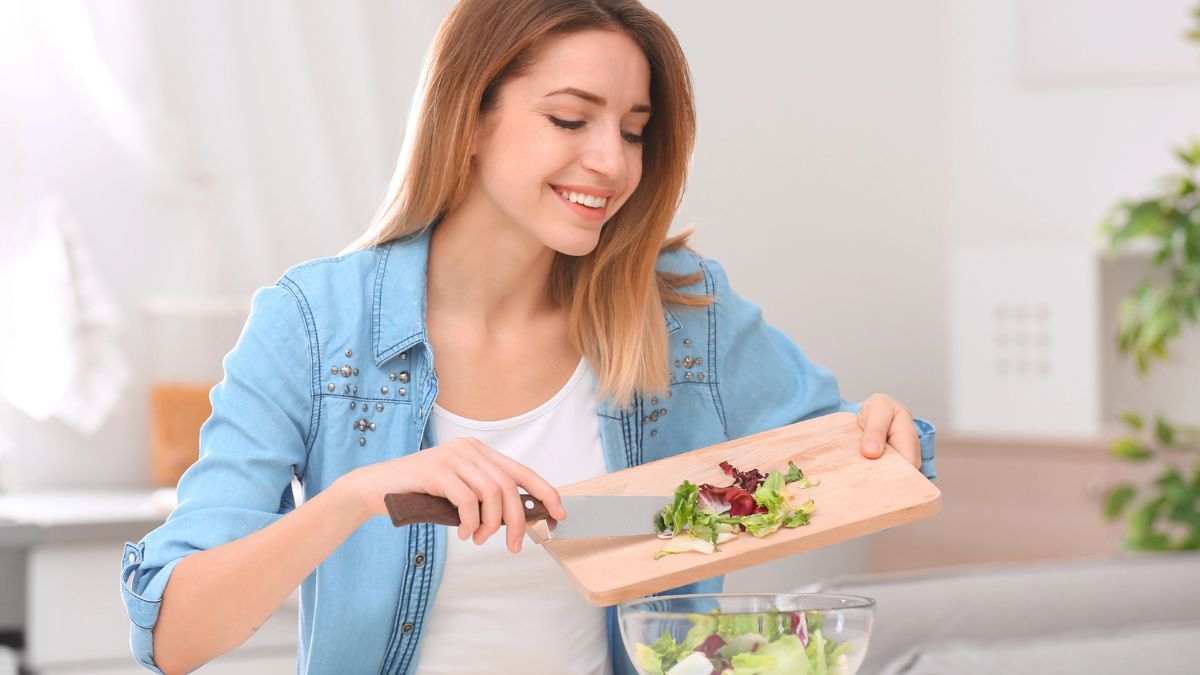 woman making salad