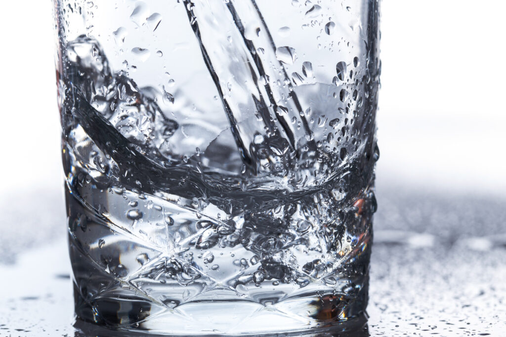 Glass with water on the table