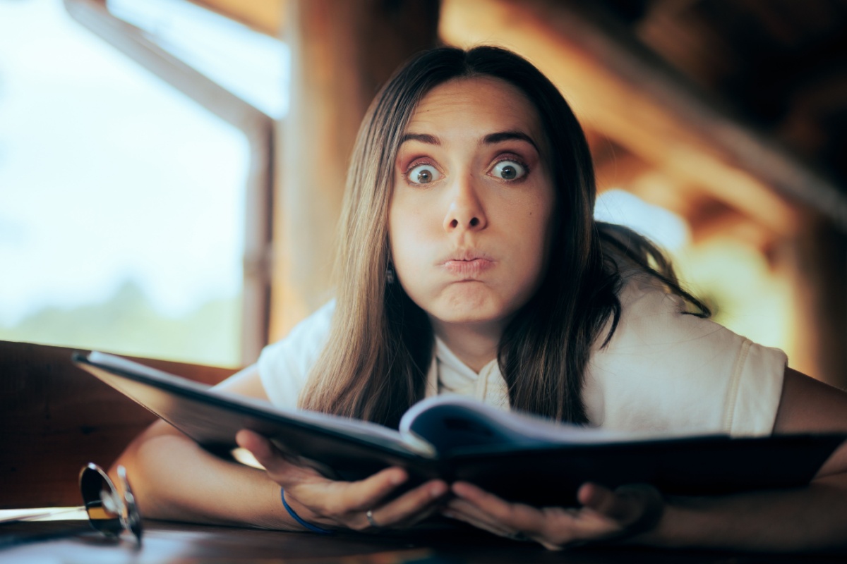 Undecided Woman Checking the Menu in a Restaurant