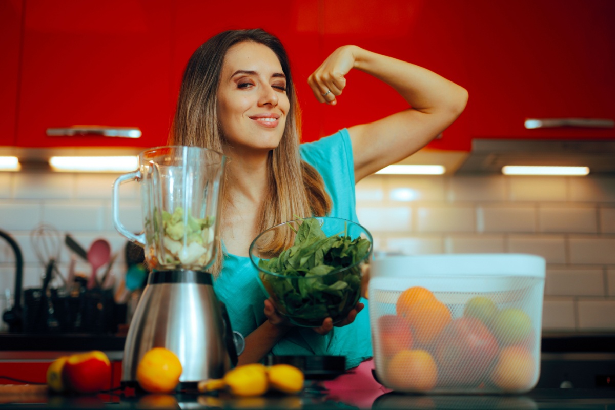 Woman Making a Spinach Smoothie