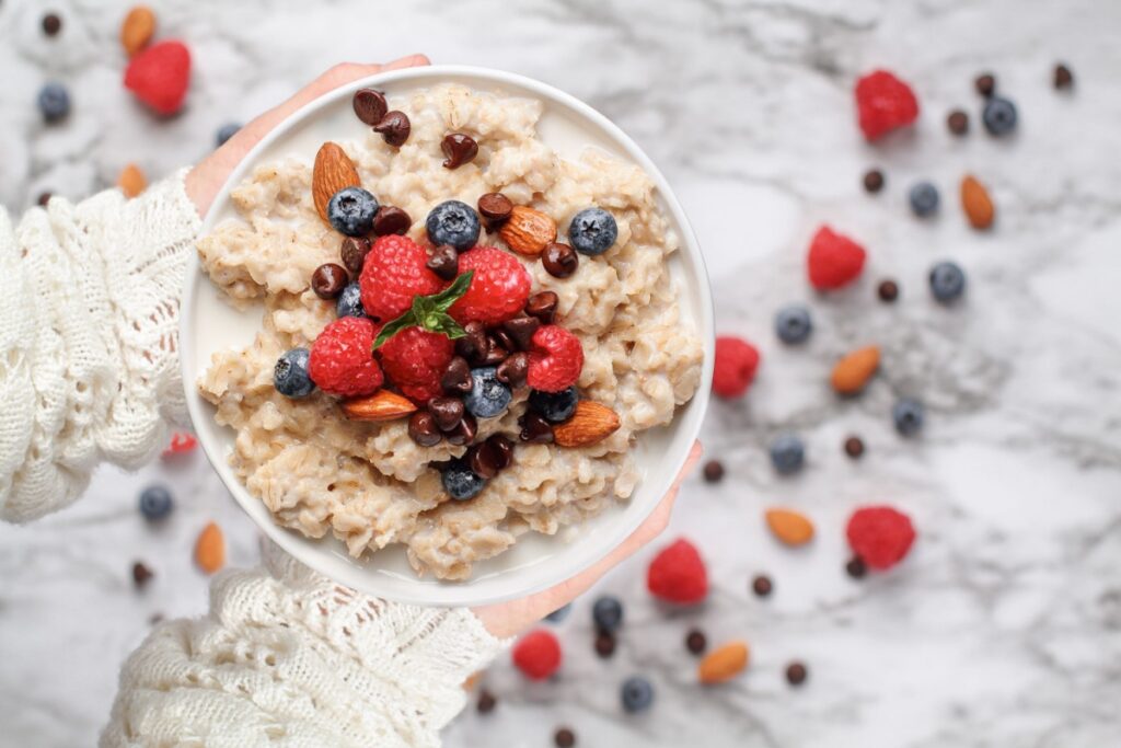 cooked oats Healthy oatmeal served with berries