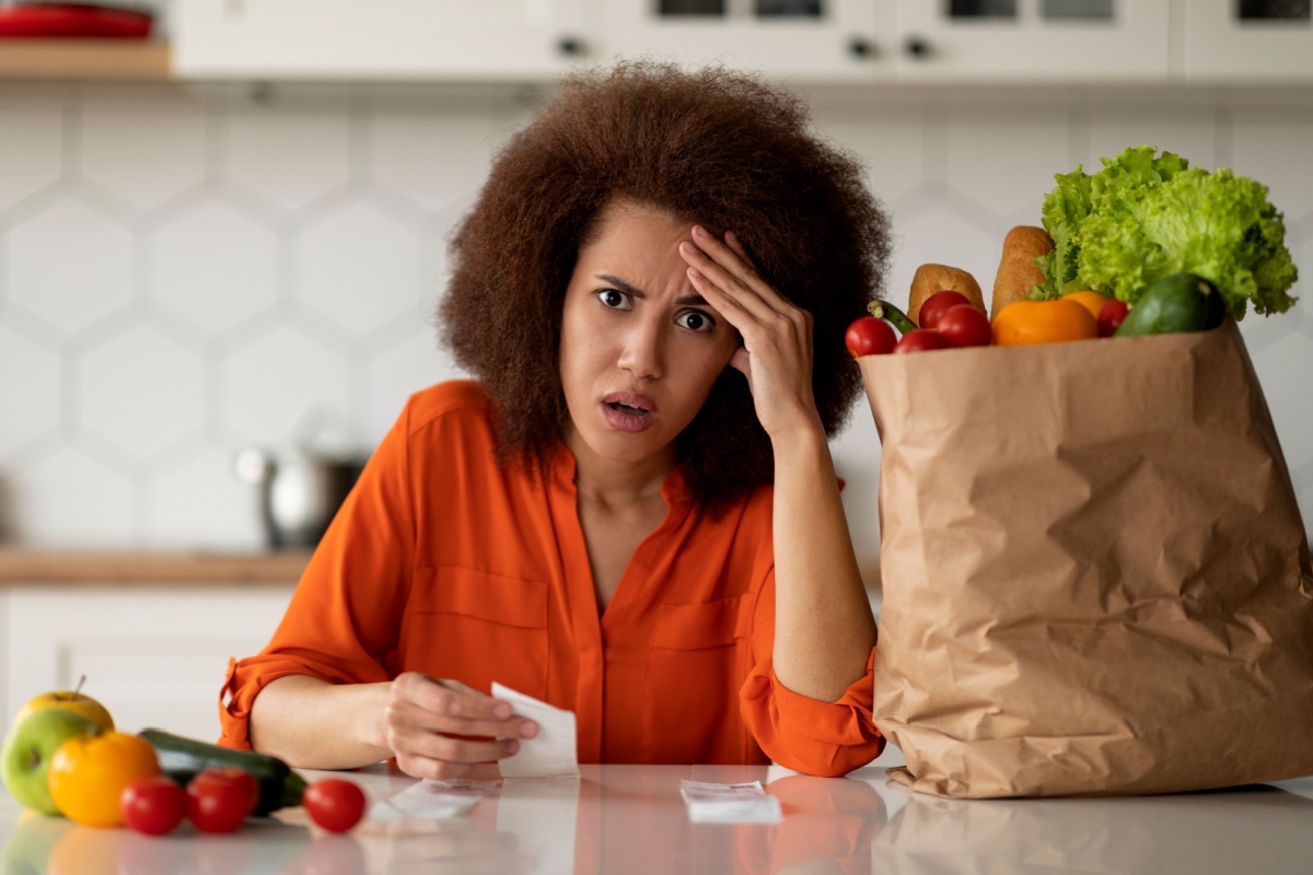 expensive groceries shocked woman with receipt