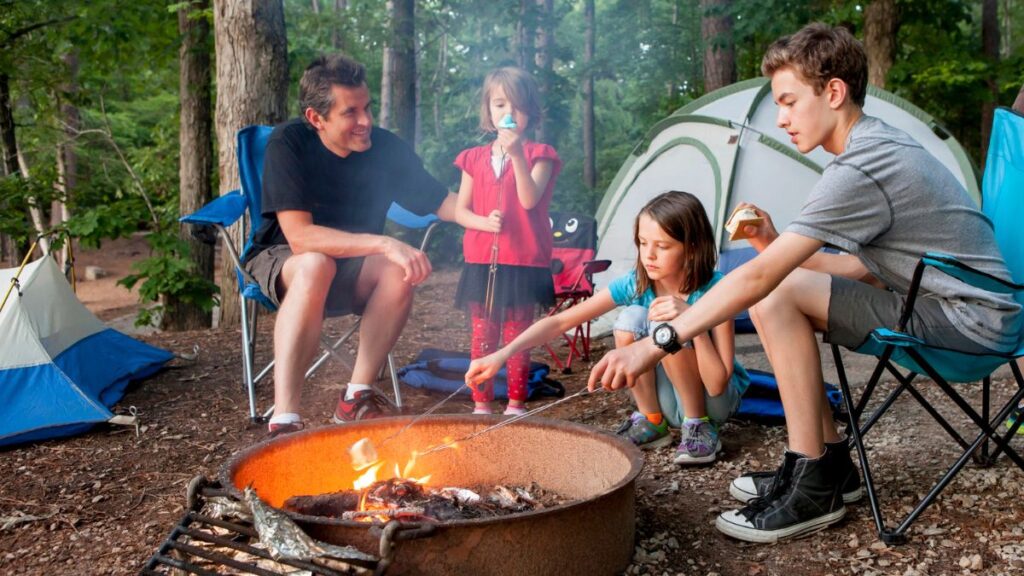 family around campfire