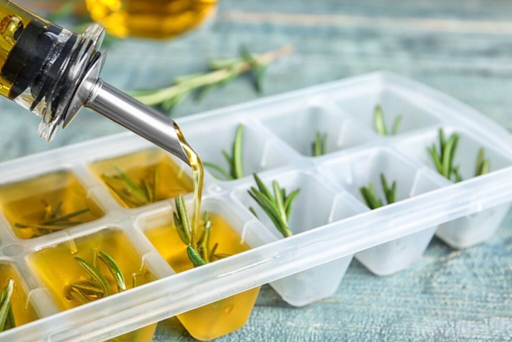 freezing herbs in ice cube tray olive oil