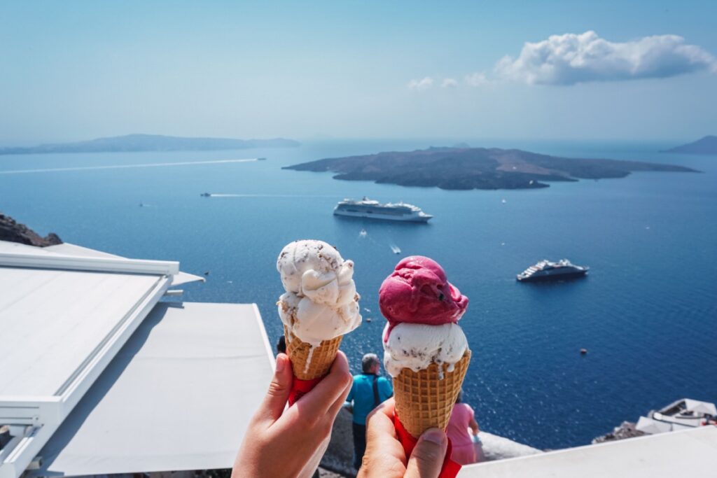 ice cream cones facing the sea