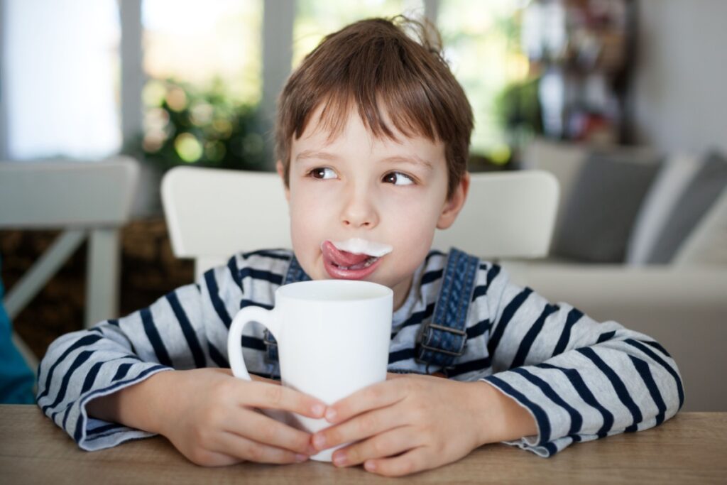 kid drinking milk mustache