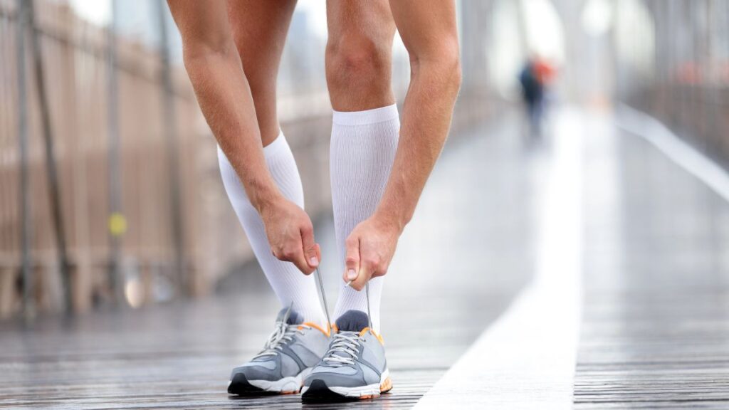 man wearing compression socks