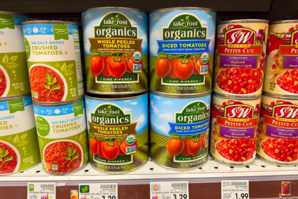 processed food canned tomatoes on grocery shelf