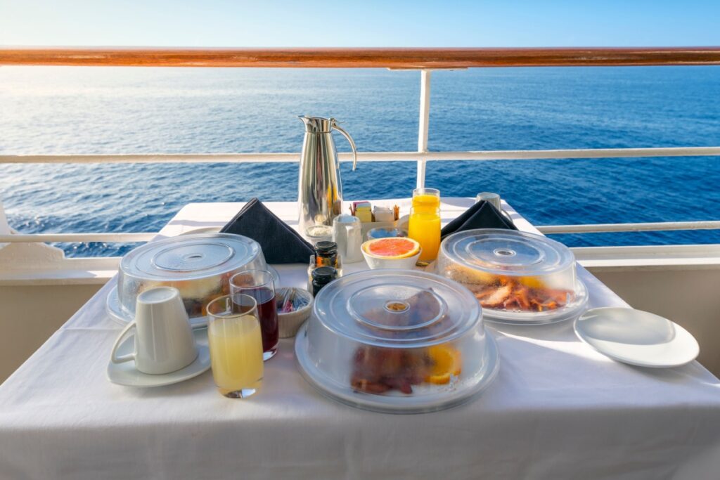 room service breakfast on a balcony of a cruise ship