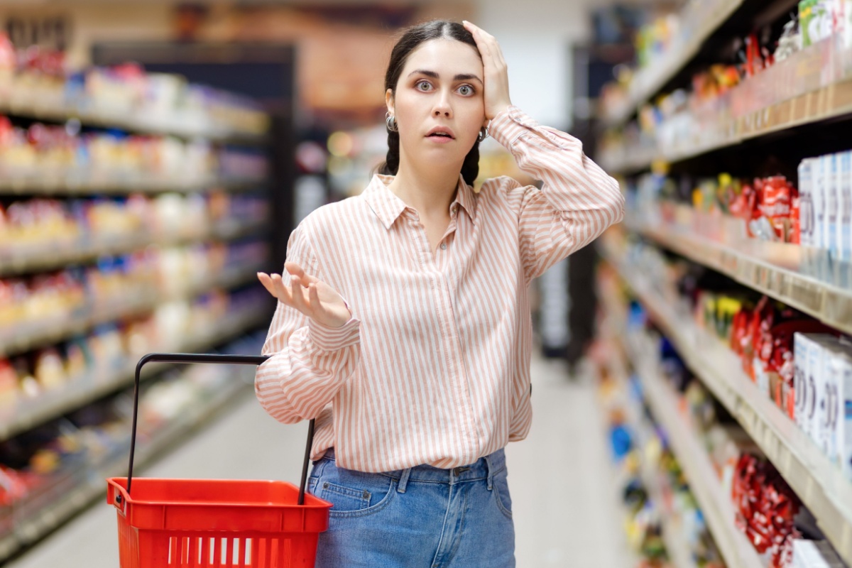 shocked grocery shopper confused inflation