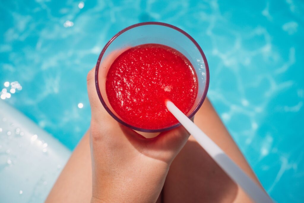 strawberry smoothie over pool