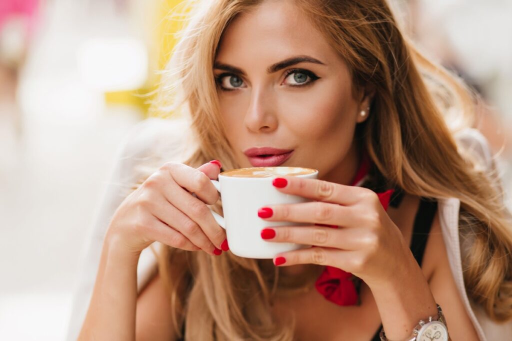 stunning beautiful woman drinking coffee espresso