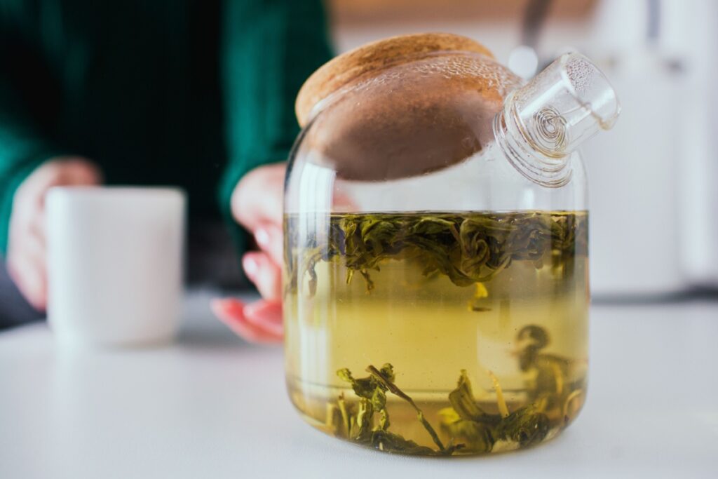 teapot with green tea inside