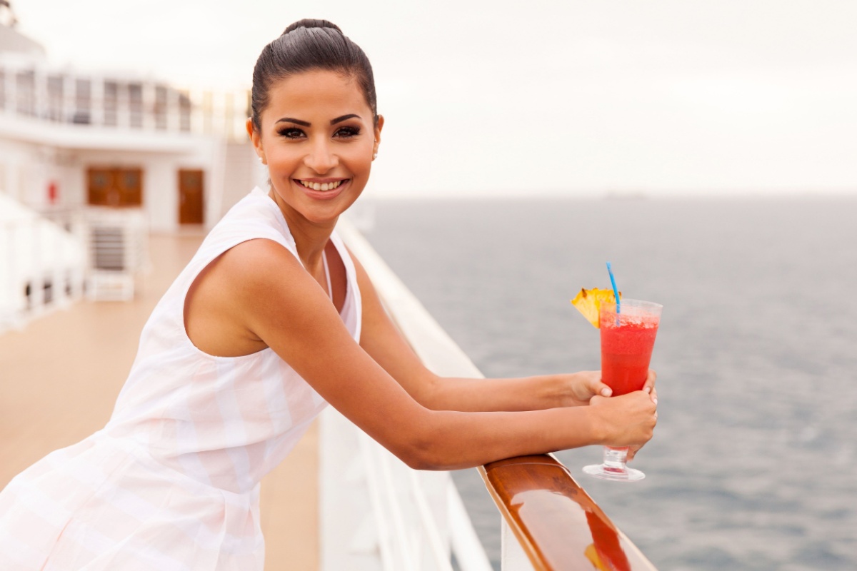 woman drinking alcoholic drink on cruise ship