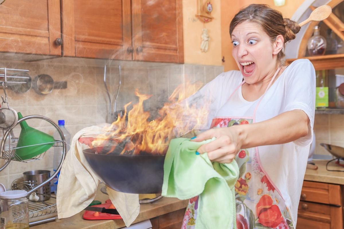 woman holding a burning bowl