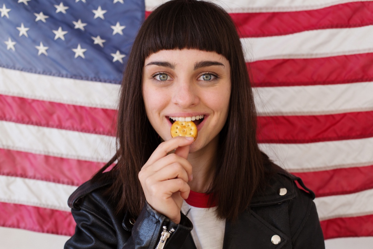 American girl with Ritz peanut butter cracker