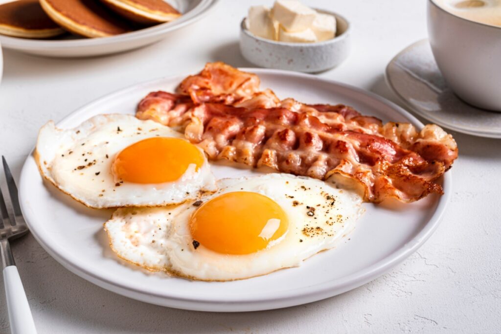 Breakfast with fried eggs and bacon