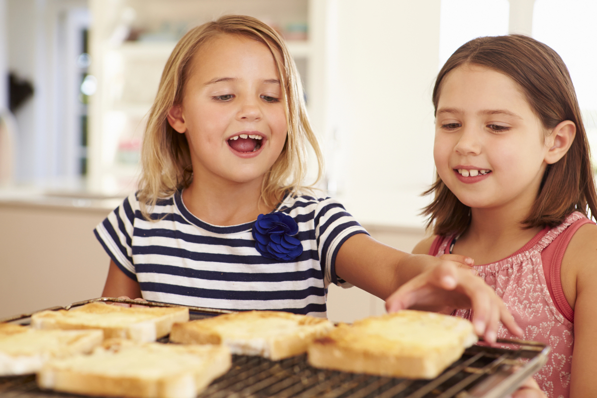 Girls Eating Cheese On Toast