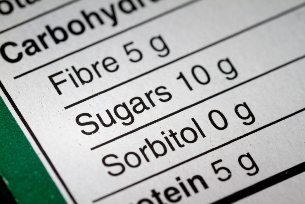 Shallow depth of Field image of Nutrition Facts Carbohydrate Information we can find on a grocery Store Product.