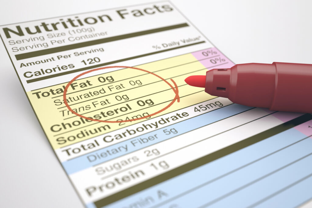 Nutrition facts with zero values of fat, marked with a red pen.