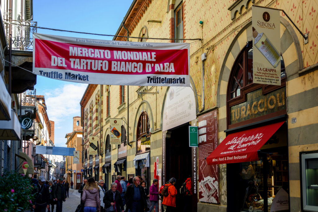 ALBA, ITALY – NOVEMBER 15, 2018: People entering the truffle market of the International Truffle Fair of Alba (Piedmont, Italy), main truffle event in all Italy, on November 15, 2018.