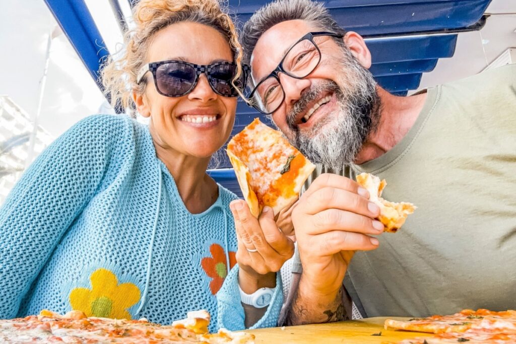 couple on date eating Margherita Pizza