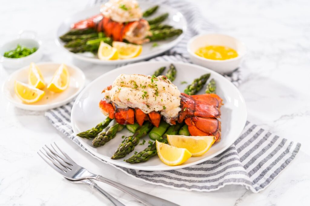 garlic lobster tails with steamed asparagus