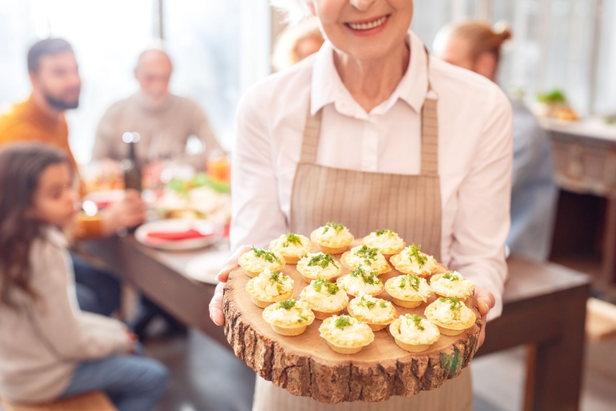 grandma holding holiday appetizer