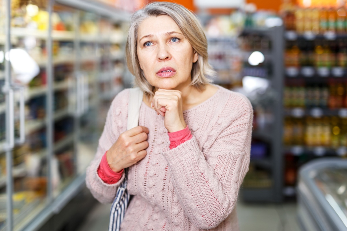 middle aged female shopping at grocery shop