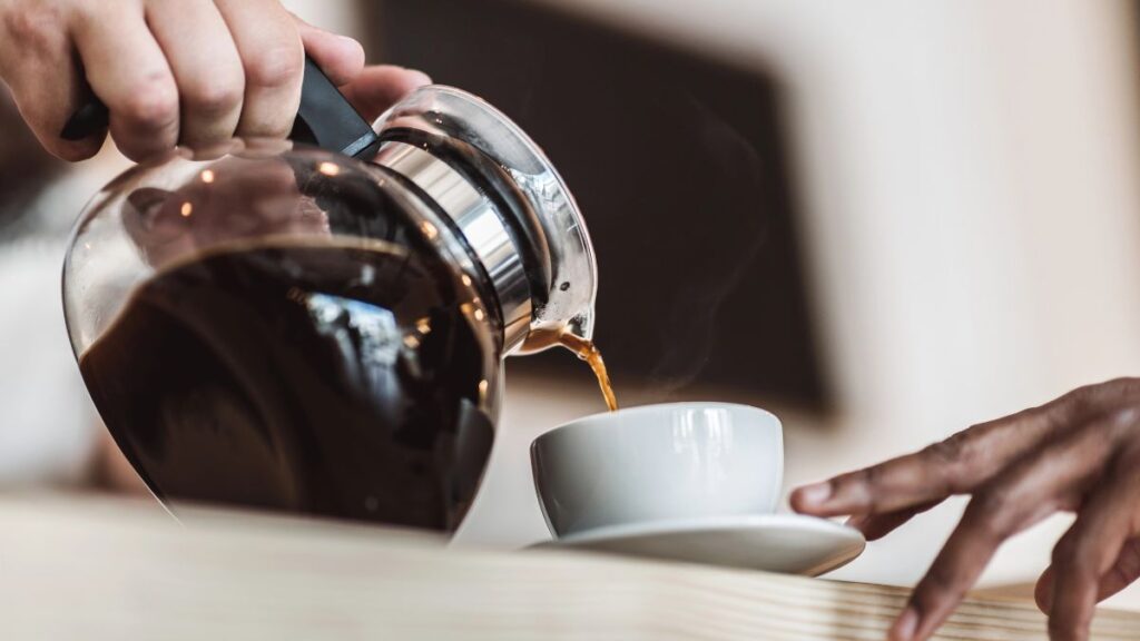 pouring coffee into a mug