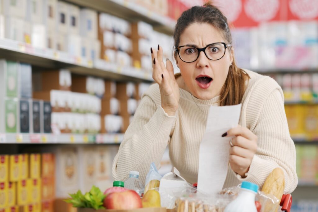 shocked grocery shopper expensive groceries receipt