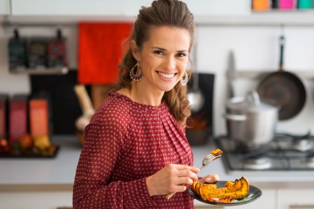 woman eating pumpkin Thanksgiving