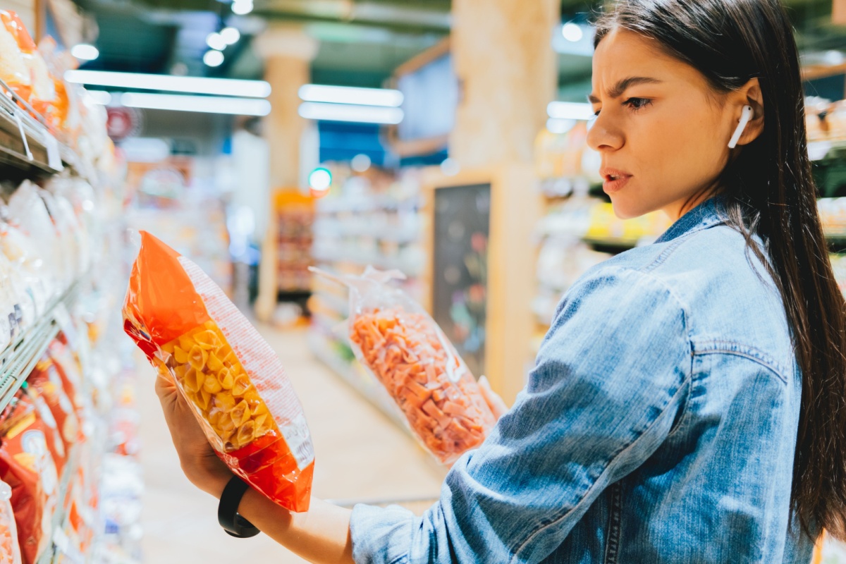 woman reading grocery food labels