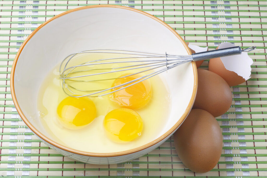 Eggs and whisk