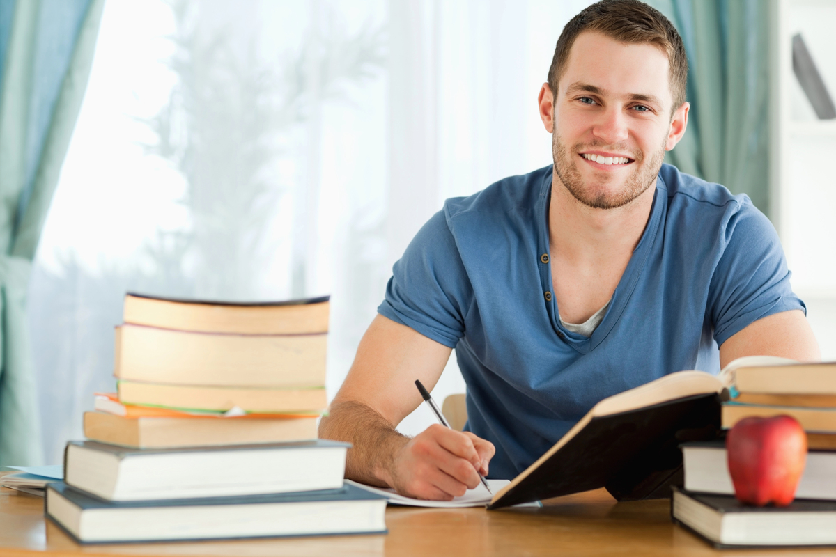 Smiling student preparing for test