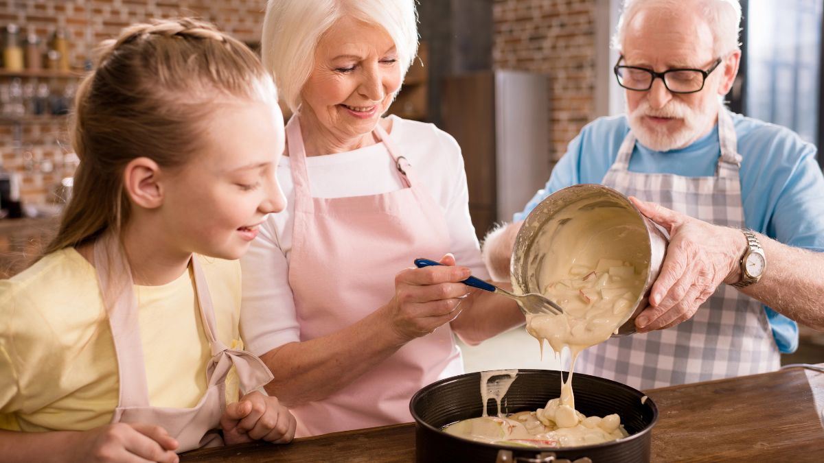 grandparents baking with girl