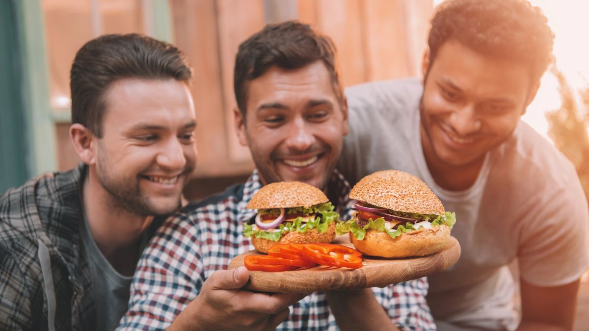 happy friends with burgers