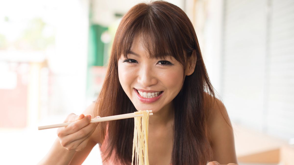 woman eating ramen